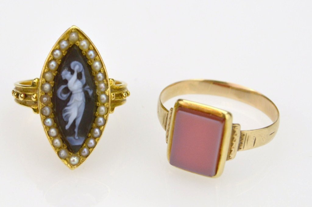 Two Early 14K Gold Rings.: Both 14K yg including a ring containing a carnelian tablet and another with a marquise shaped black and white banded agate cameo, ring sizes 9 3/4 & 7, 4.6dwt total.