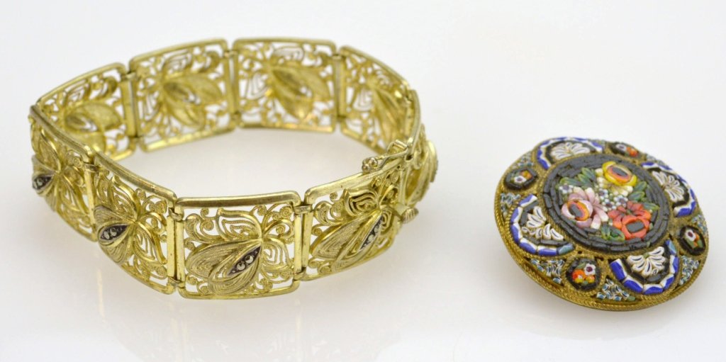 Vermeil bracelet and micro-mosaic brooch.: Vermeil bracelet marked SILVER & GERMANY with spun gold appearance, contains faceted marcasite, 7 along with a round floral micro-mosaic brooch, gold-filled backing."
