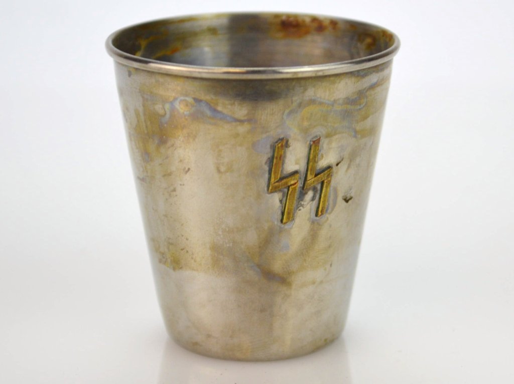 German SS Shotglass: Has applied SS insignia and stamped Carl Wusthof solingen on bottom. measures 2.25h"