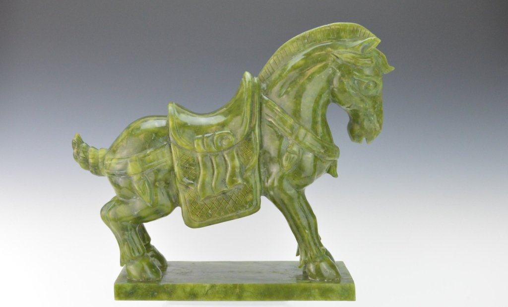 Chinese Spinach Jade Horse Carving: Chinese Spinach Jade Saddled Tang War Horse Carving. 9 3/4" long x 8 1/2" High. 16,755 carats