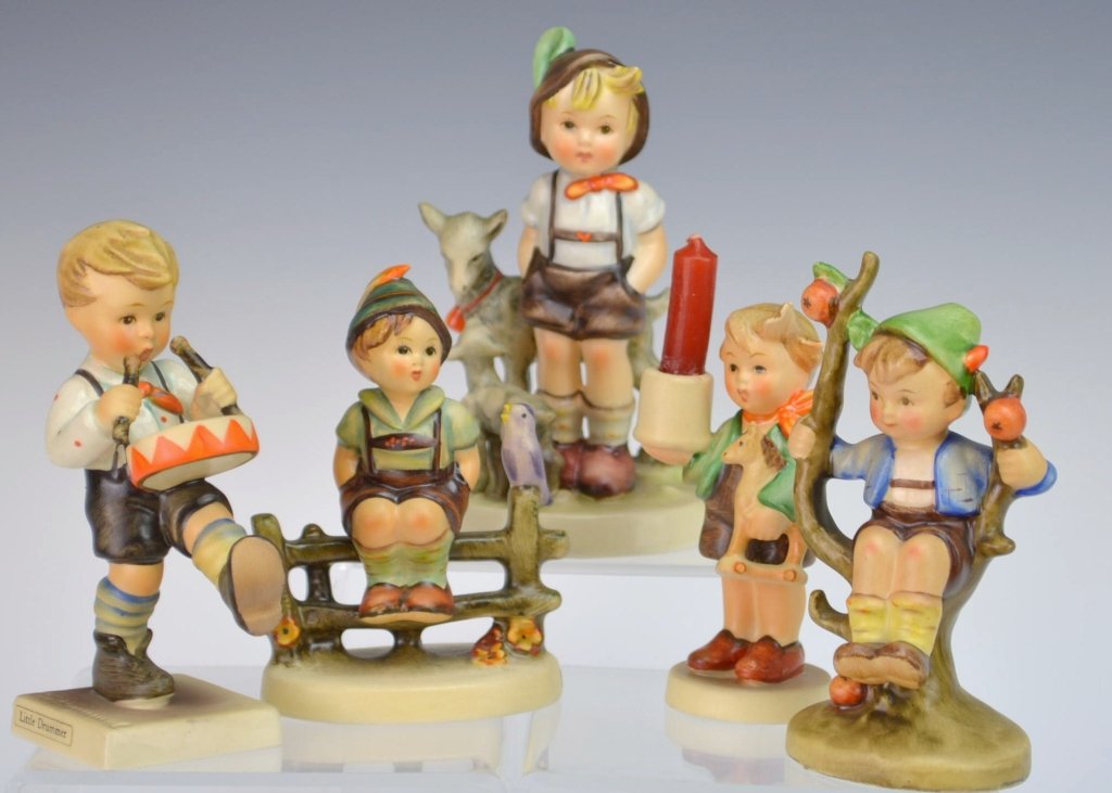 Hummel Grouping: #117 Advent Candlestick tmk2 3.75", #200/0 Little goat herder tmk4 5", #111 3/0 Wayside Harmony tmk4 4", #142 3/0 Apple tree boy tmk2 4", #240 Little Drummer tmk4 4.5"