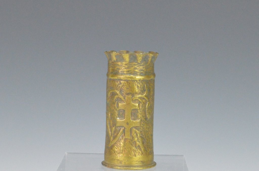 WWI Trench Art: This nicely carved of trench art is made from a model of 1916 37mm round and measures 3.5"