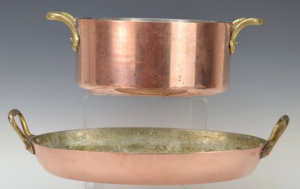 French Copper Cookware Grouping: Shorter piece is marked Lamalle New York City, Made in France, and stamped ERH on the bottom. Measure 10" and 8" in diameter.