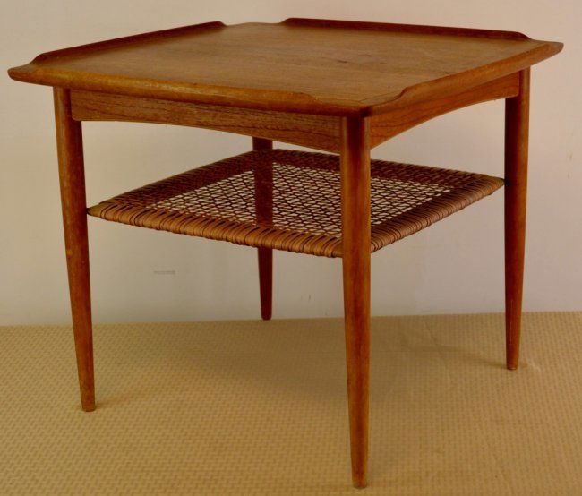 Poul Jensen Mid Century Modern Table for Selig, Denmark: Poul Jensen occasional table, for Selig, Denmark, teak, square top with raised lip to edges over a caned lower shelf, original finish, Selig metal decal missing to underneath of table. Measures 23.5"