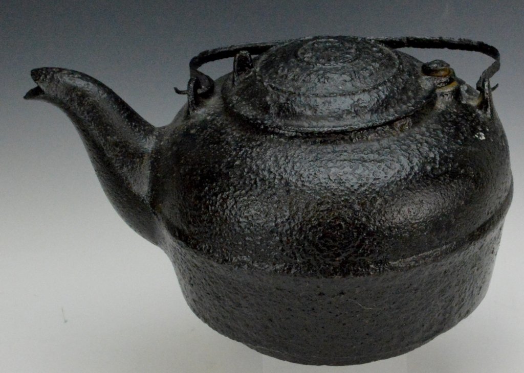 Large Cast Iron Coffee Pot: Marked Scranton Pa, measures 13"x9". Does have small hole in the base.