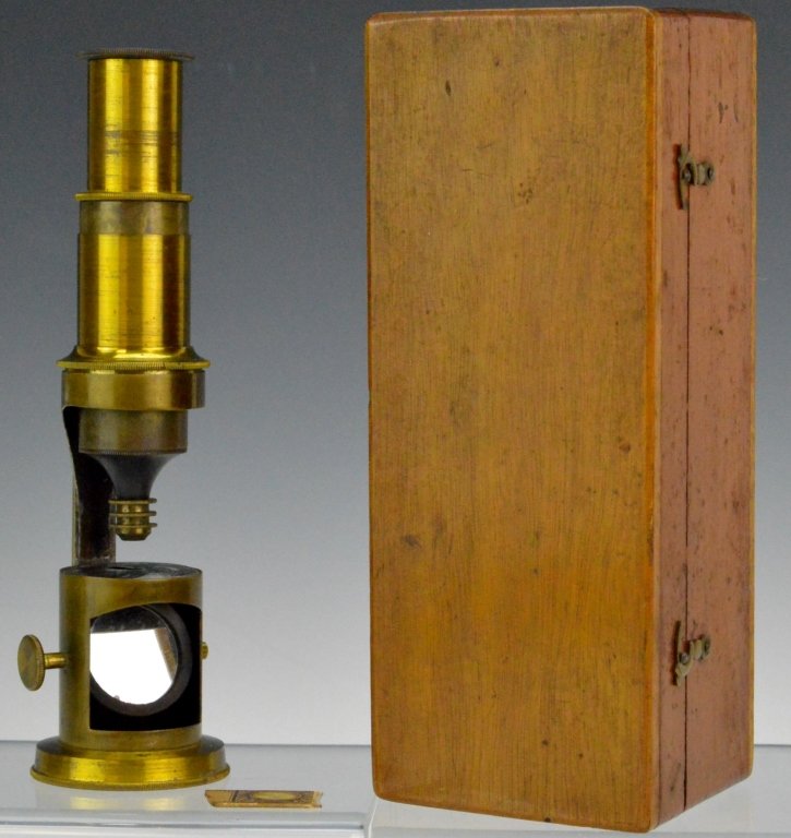 Antique Cased Brass Field Microscope: This early brass field microscope is unmarked, and retains the original case and one partial sample slide (which I used to verify that it worked) . Measures 6.5"