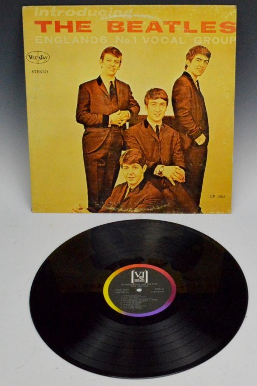 Introducing the Beatles Album Vee-Jay Records: Includes a copy of the introducing the Beatles album from Vee - Jay records, cover shows wear but the album itself is in great condition.