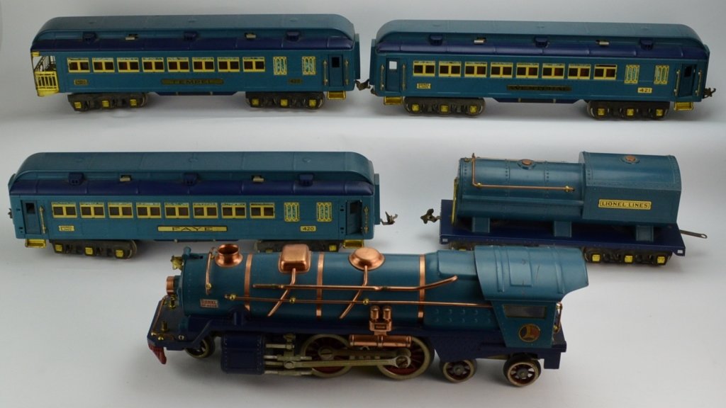 Lionel 400E Blue Comet Passenger Set OBS: Includes Lionel Prewar #400E 4-4-4 Blue Comet locomotive with tender, together with #420 Faye, #421 Westphal and #422 Tempel observation cars. Locomotive drive wheels are embossed Lionel corporation. 