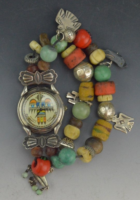 Peyote Bird Watch: Peyote Bird Designs watch with sterling silver accents and large beaded band.