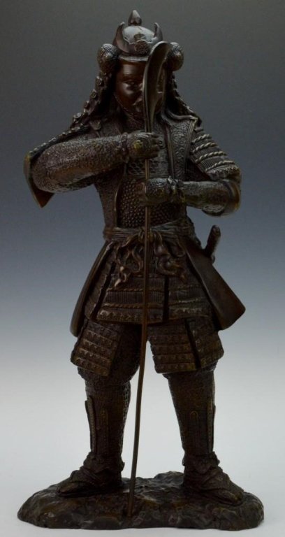 Bronze Samurai Warrior Statue: Japanese warrior in his traditional battle armor. Weighted base. Unsigned. A great looking piece with removable weapon. Measures 18-1/3 inches tall on 9 inch base