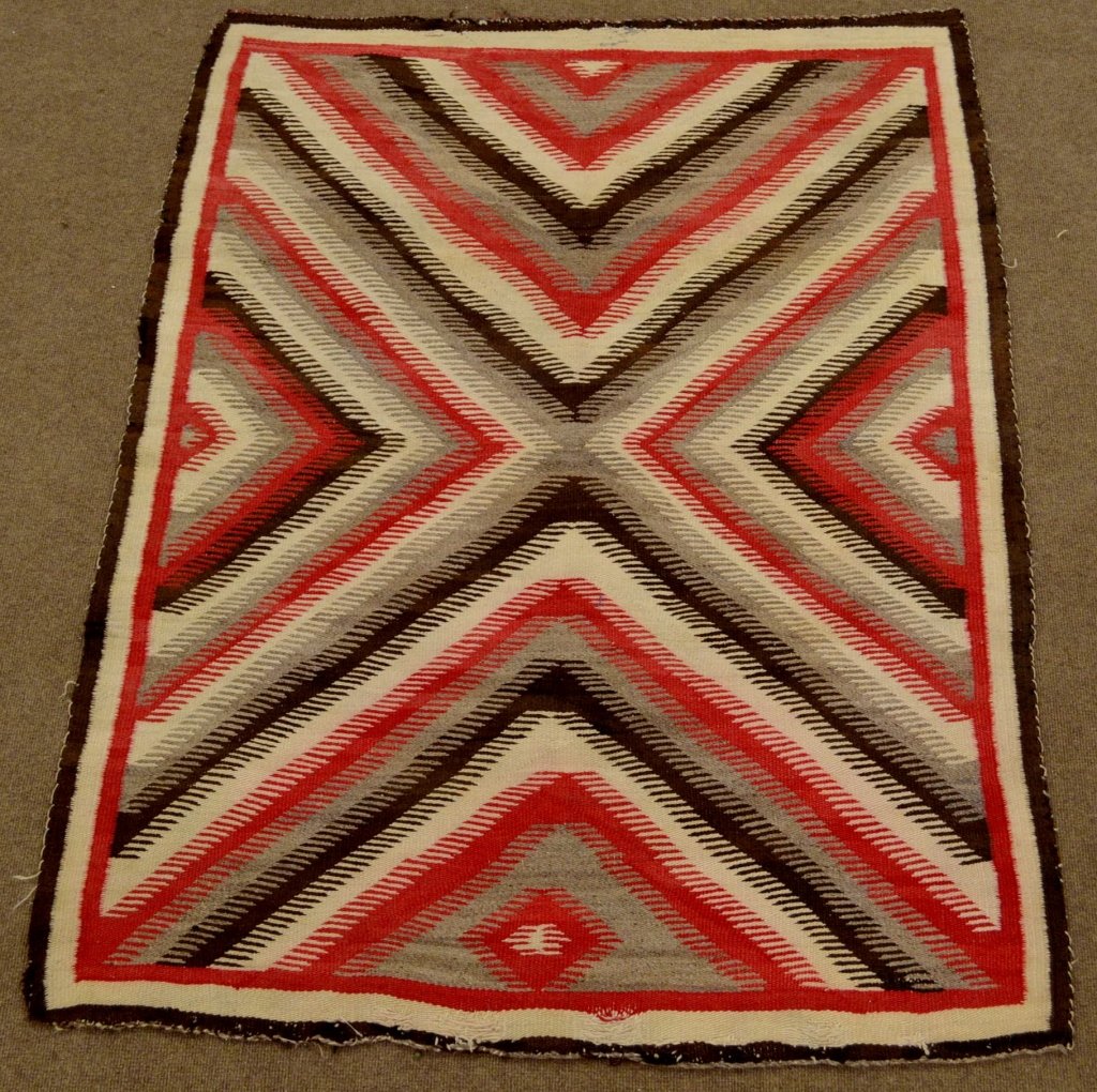 Navajo Ganado or Klagetoh Rug: A fine Navajo Ganado or Klagetoh Rug, in as found condition with minor repairs to edge. Similar an eye dazzler pattern. C. 1900-1925. Measures 59" x 45"