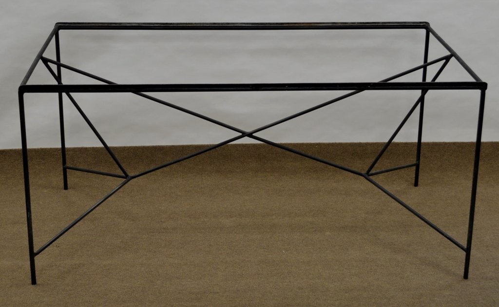 Paul McCobb Arbuck Wrought Iron Table: PAUL McCOBB / ARBUCK Rare wrought-iron dining table with cat's cradle stretcher. measures 60" x 34" x 28" Glass would be approximately $350 for 1/2" thick tempered with polished edge.Please note the l
