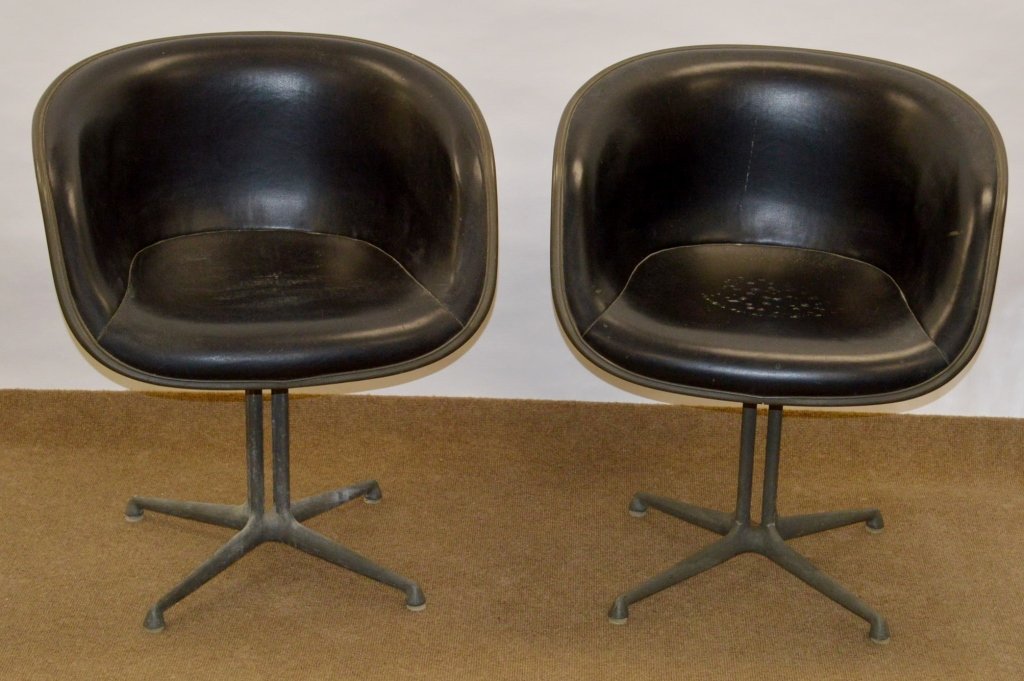 Charles & Ray Eames La Fonda Chairs: Set of (2) Charles & Ray Eames La Fonda chairs, four by Herman Miller, c.1961, molded fiberglass seats over aluminum bases, each signed with impressed Herman Miller mark.