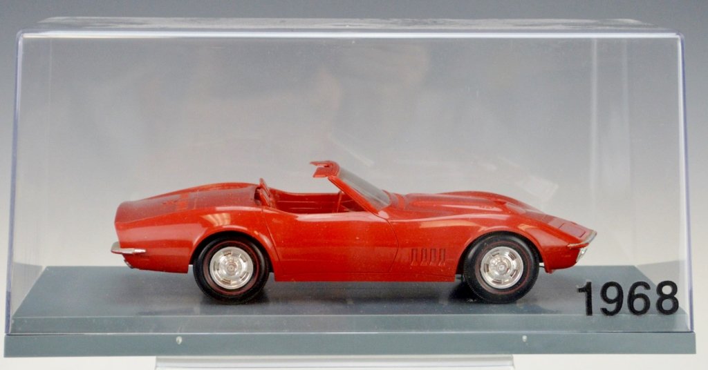 1968 Corvette Dealer Promo: Includes 1968 red Corvette covertible dealer promo in display.