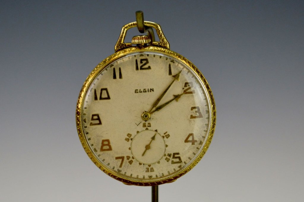 14k Yellow Gold Lord Elgin Pocket Watch: 14k yellow gold open face pocket watch in 14k wadsworth case. 19 Jewels, serial number 24791739, circa 1921. Does wind and run, but not guaranteed.