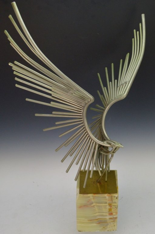 Curtis Jere Eagle Sculpture: Marble base missing corner and base of eagle has crack. Measures approx. 27" x 18"