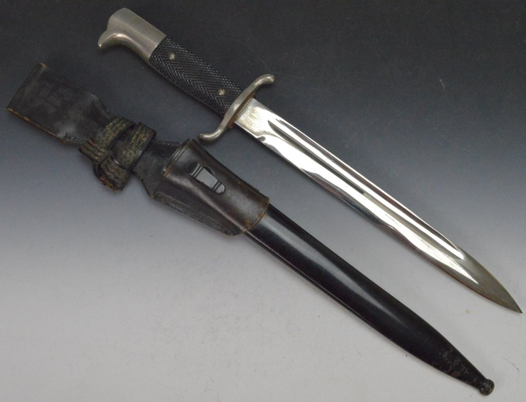 WWII German Firemans Dress Dagger: WWII German Firemans Dress Dagger includes frog and sheath, marked Fritz Massong Saarbrucken, measures 25cm or 10"