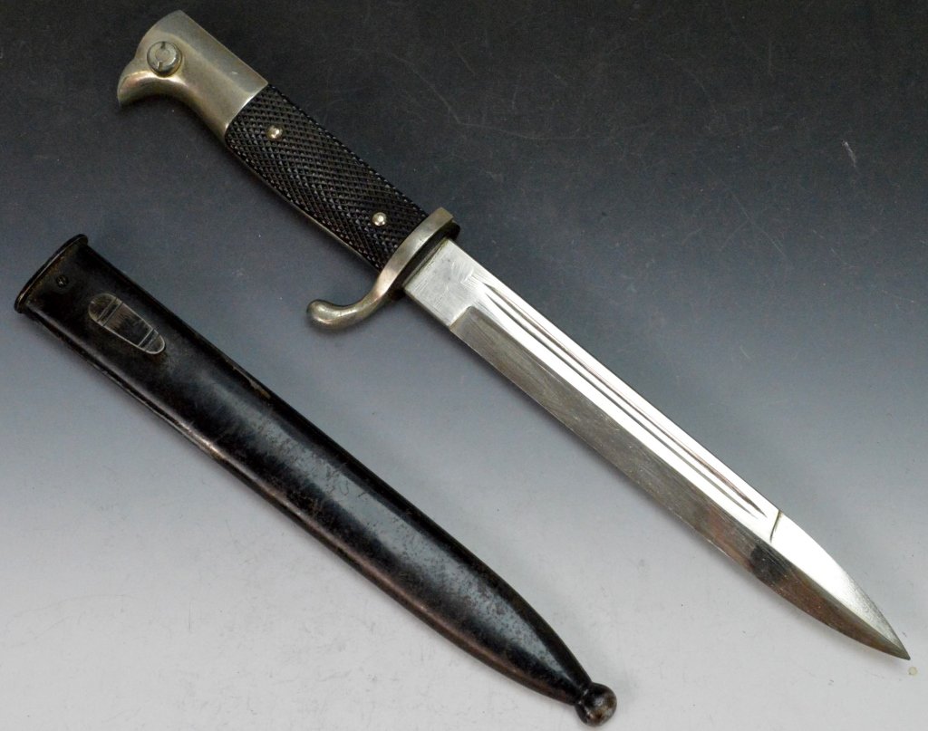 WWII German Armed Forces Dress Bayonet: WWII German Armed Forces Dress Bayonet with sheath, NCO. Unmarked blade. Measures 20cm or 8"