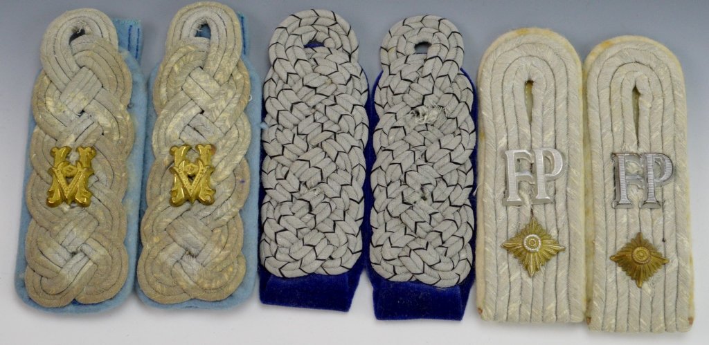 German WWII Shoulder Board Grouping: Includes (3) pairs, RAD senior official shoulder boards on dark blue background, army infantry with gilt pips, "FP" or field post cypher, and officer board with armed forces official cypher on light b