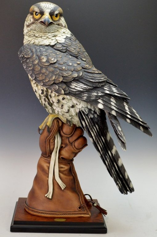 Armani Statue "The Falconer": Includes the absolutely stunning limited edition statue " The Falconer" . Hand crafted from the design by Giuseppe Armani. includes certificate of authenticity, numbered 2152 of 3,000. Measures an imp