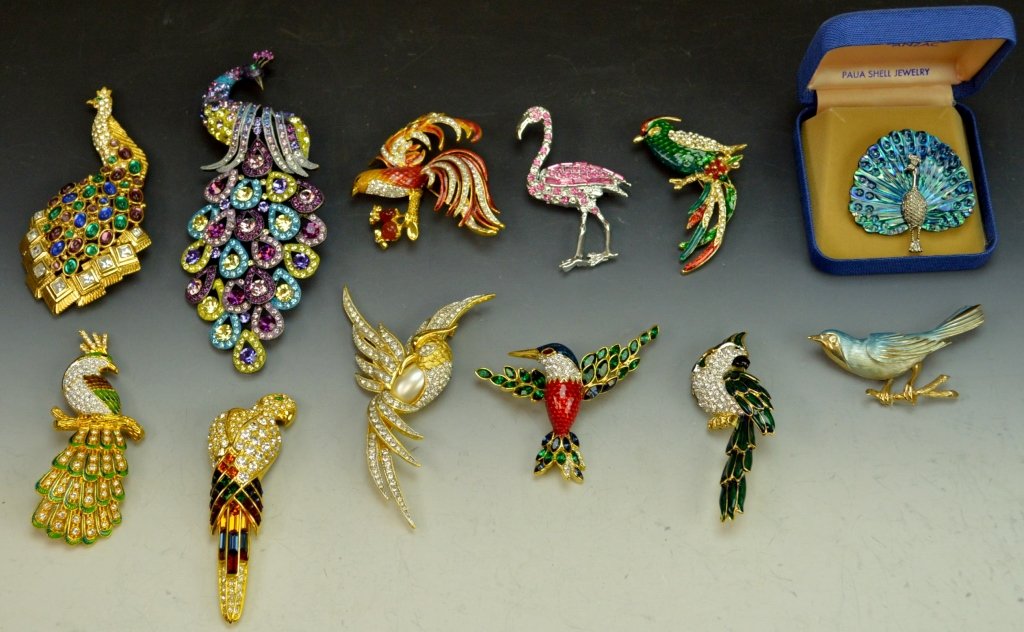 Costume Jewelry Pin Grouping: (12) costume jewelry pins in bird form, makers include Trifari, Nolan Miller, and others.