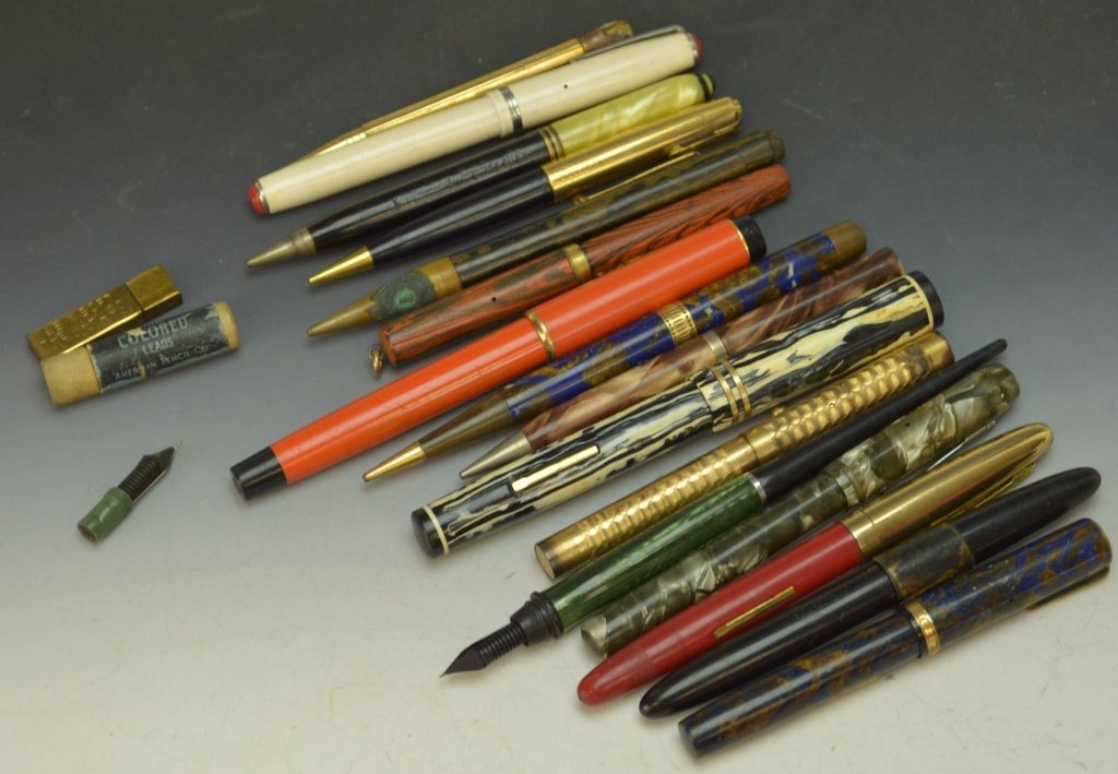 Fountain Pen Grouping: Includes fountain pens, roller pens and pencils. Makers include visopen, esterbrook, eagle pencil co with 14k nib, watermans, wahl, sheaffer and others.