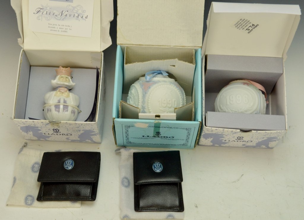 Lladro Christmas Ornament Grouping: Includes #16298 1996 Christmas Ball, #06341 King Melchor, #5730 1990 Christmas Ball, and LLadro collectors society key chain and coin purse with original bags.