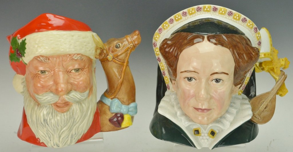 Royal Doulton Large Toby Mug Grouping: Set of two (2) large mugs. Includes: Queen Mary I, 2003, and Santa Claus with Reindeer handle, 1982. Measures about 6.75" tall.