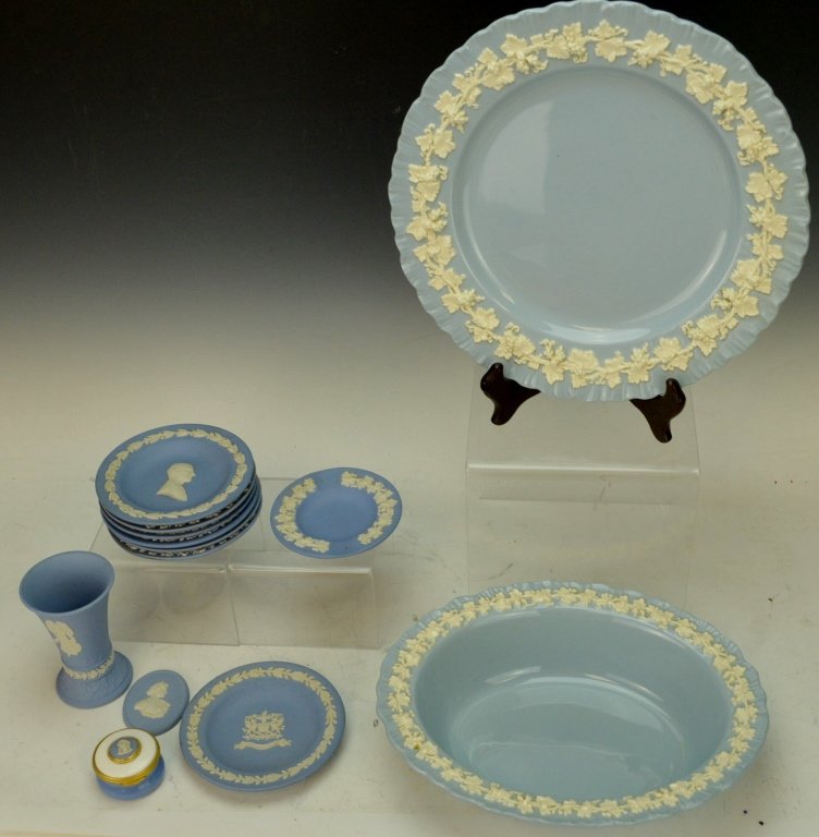 Wedgewood Grouping: Includes bowl and plate, 'Embossed Queen's Ware', plate measures 10" diameter. Lidded jar, Vase with angel motif, Ashtray, Oval bust cartouche, and Set of eight small plates/saucers, measuring 4.5" di