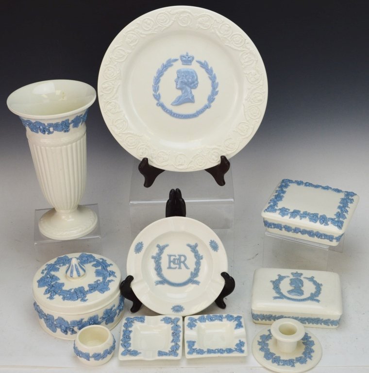 Wedgewood Grouping: Includes footed vase, measures 8.5" tall, taper holder, finger bowl, two lidded trinket boxes, lidded jar, plate and ashtray marked 'Embossed Queen's Ware', two square ashtrays. Nice set.