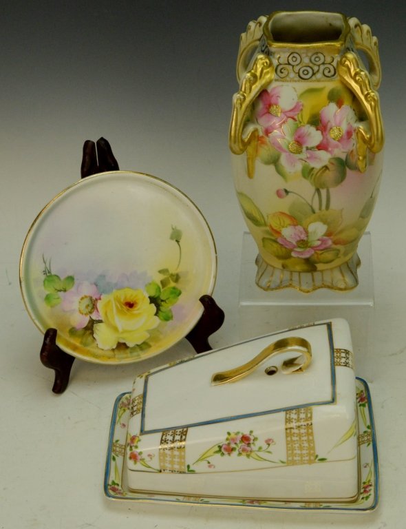 Hand Painted Nippon Grouping: Includes four handled vase measuring 8" ,covered cheese dish measuring 4.25" x 7.5", and underplate measuring 6"