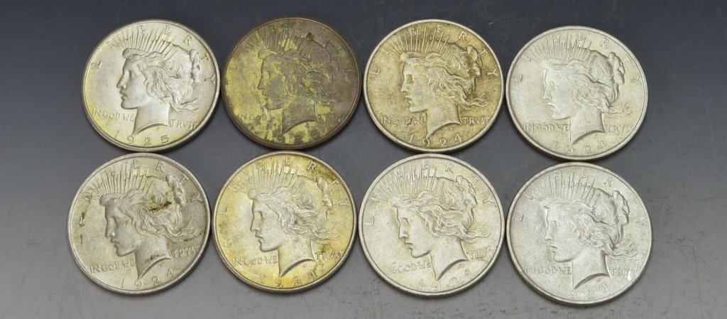 Peace Dollar Grouping: Includes (6) 1924 and (2) 1925 silver Peace dollars.