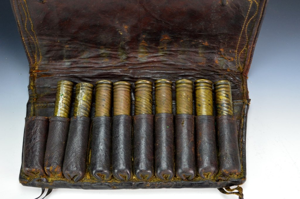 Ottoman/Persian Ammunition Carrier: Ottoman/Persian leather ammunition carrier for black powder weapons measures: 5â€ x 10â€. Missing one tube