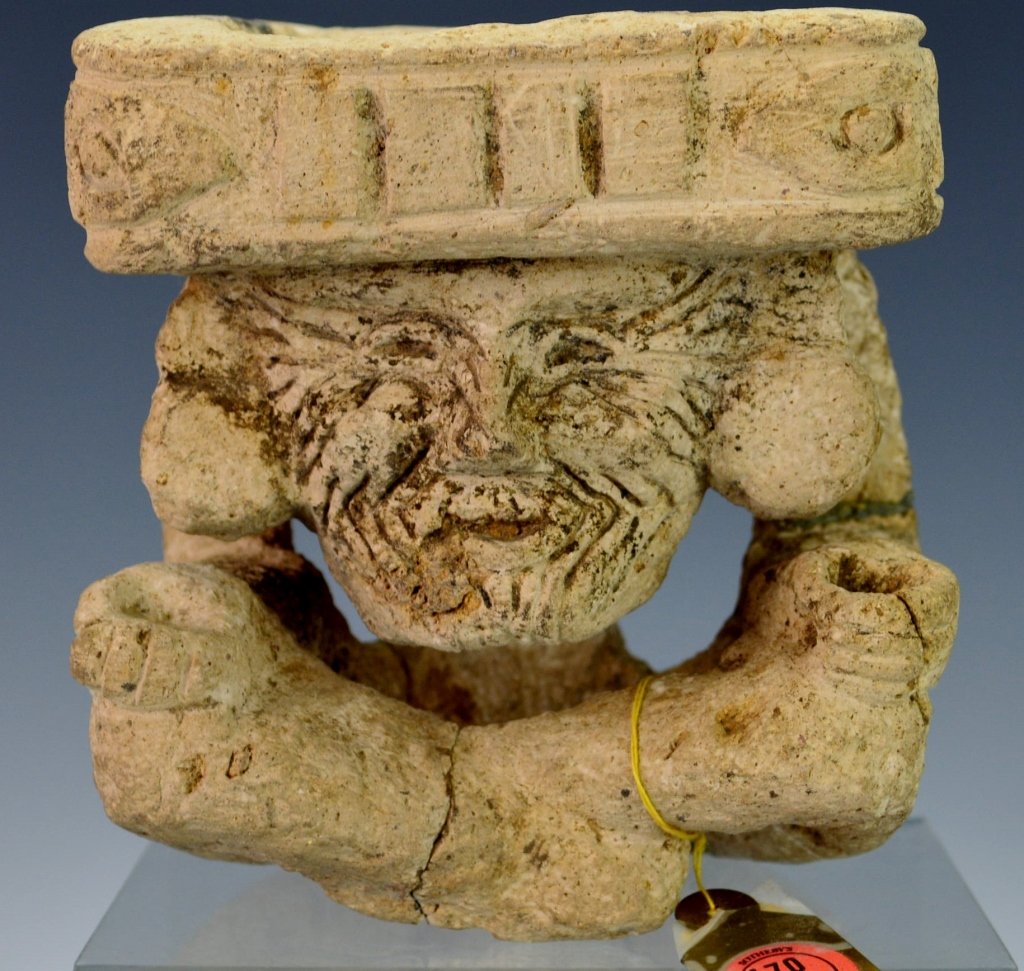 Teotihuacan Stone Fire God : Sotheby's: Early classic, c. 300-600, the cross legged aged figure with hands cupped, the face covered by deep furrows representing Huehueteotl, the fire god, supporting a square-shaped brazier decorated on the 