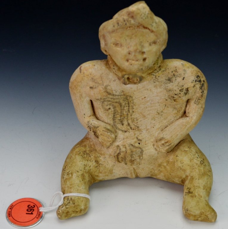 Preclassic Seated Female Figure, El Salavador : Sotheby: middle preclassic, 1150-550 B.C. with olmec influence in the widely spread outward -turned leg position, hands placed at the sides of her stomach, wearing choker and peaked headdress and painted overa