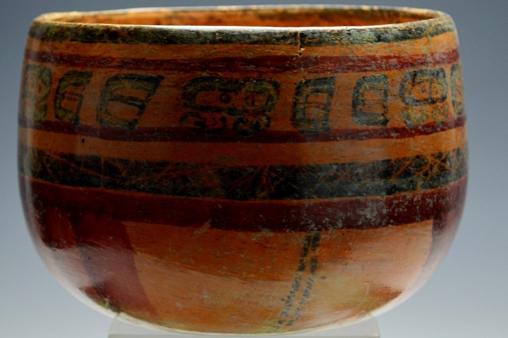Mayan Polychrome Bowl : Sotheby's: classic, c. A.D. 500-950 in deep orange and black painted on a tan ground with a band of glyphs at the top and linear motives below. Diameter 6.5". Provenance: Sotheby Parke Bernet 2/11/77 lot #97, re
