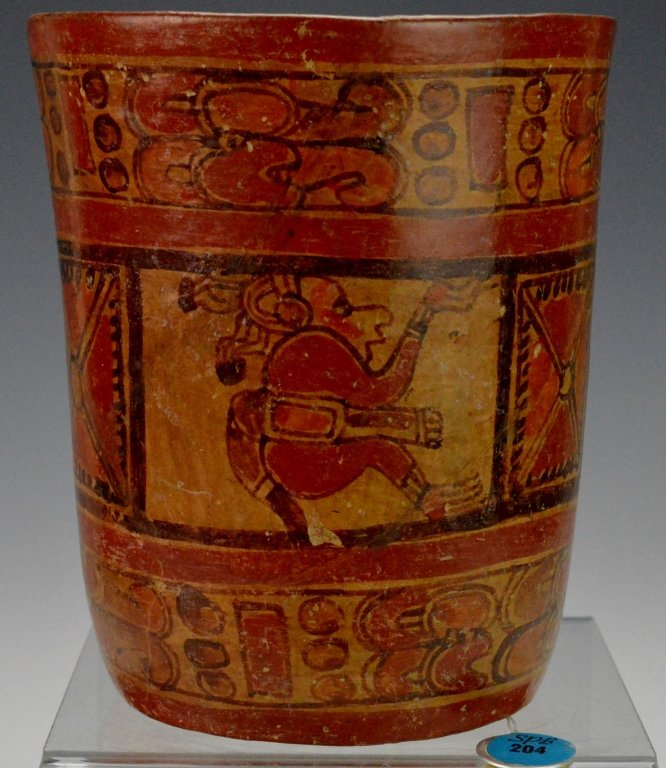 Mayan Painted Cylindrical Vase : Sotheby's: El Salvador, Late Classic, c. 550-950 A.D., painted in dark reddish-brown, orange, and black on a tan ground with three panels each containing a seated figure, alternating with three square shaped pan