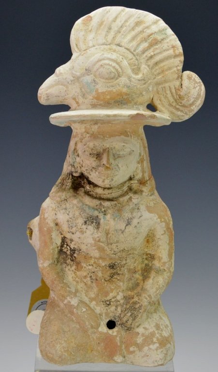 Mayan Seated Female Dignitary : Sotheby's: Jaina, late classic, c. 550-950 A.D., adorned with jewelry and a massive headdress consisting of a wide brimmed hat surmounted by the profile head of an avian with sweeping feather crest, with extensi