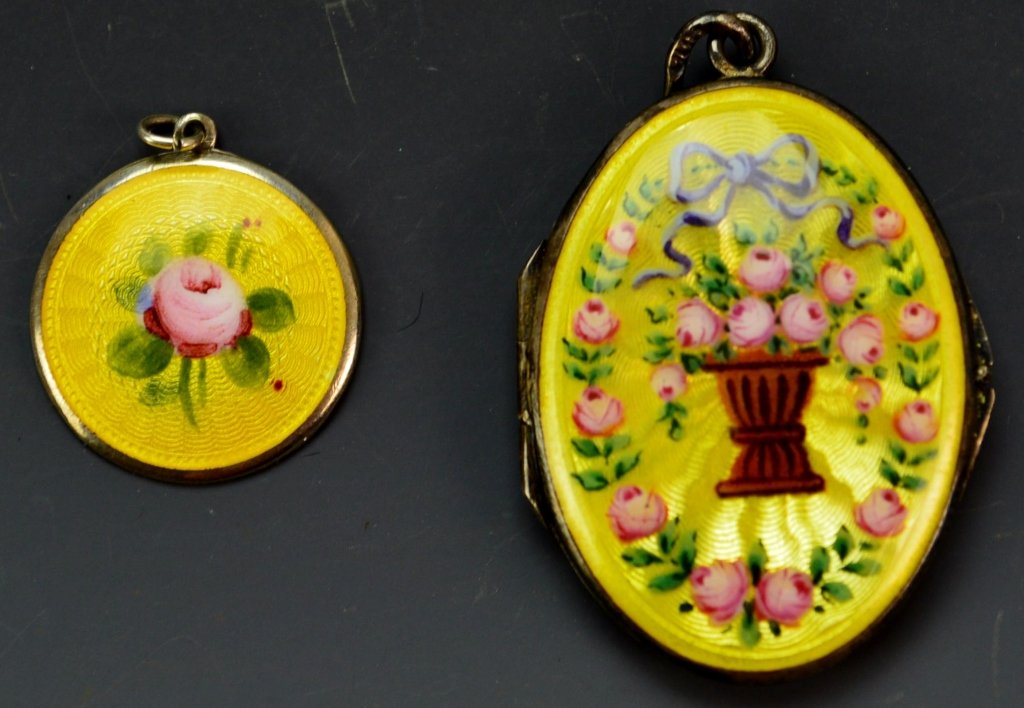 Sterling Silver & Guilloche Pendant Lot: Lot contains 1 pendant and 1 locket both nicely decorated in a floral guilloche