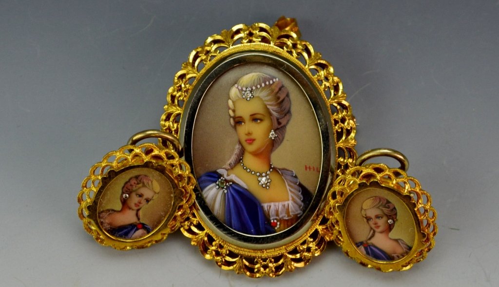 18k YG Miniature Portrait Brooch and Earrings: Hand painted miniature portrait adorned with (3) single cut colorless stones of a noble woman. Beautifully set in 18k yellow gold. Back plate marked 18kt Italy, bale marked 750 Italy, and entire case