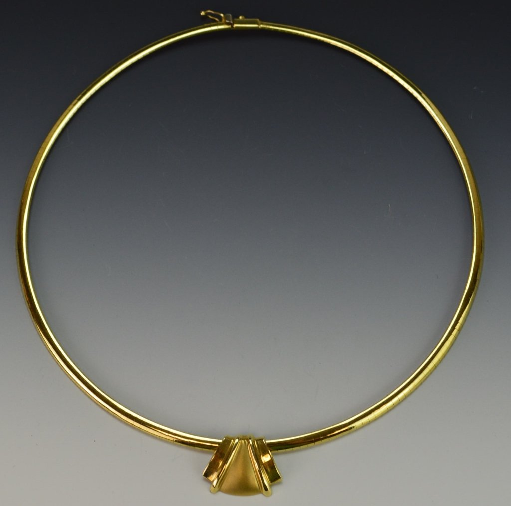 14k Yellow Gold Omega Choker and Pendant: Includes 14k yellow gold choker and pendant, 5.5" diameter when closed. 16.2 Dwt