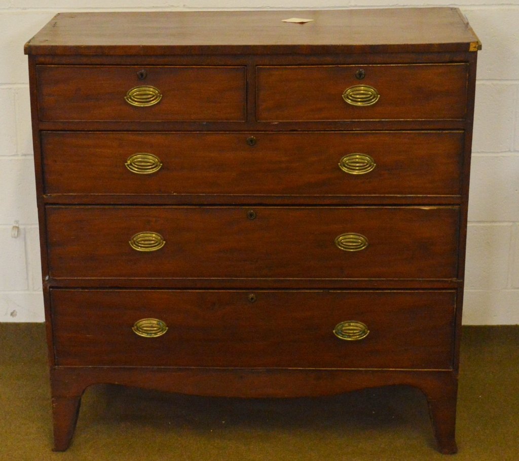 Hepplewhite Dresser: A Mahogany Hepplewhite dresser or chest of drawers constructed with (2) drawers over (3) graduated drawers, resting on a French foot. Piece is in rough condition, needing repair, There is loss of wood