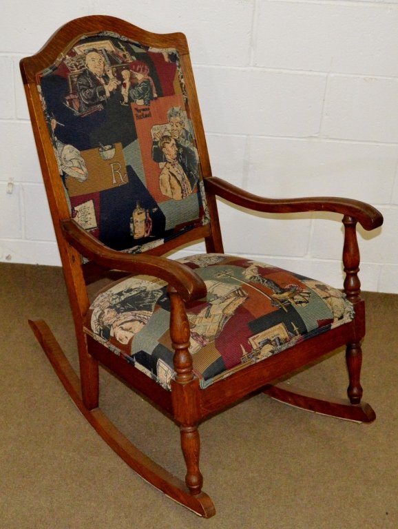 Oak Rocking chair: A solid oak rocking chair in a newer upholstery. Circa 1920-1930. Measures: 24" x 34.5" x 39.5"