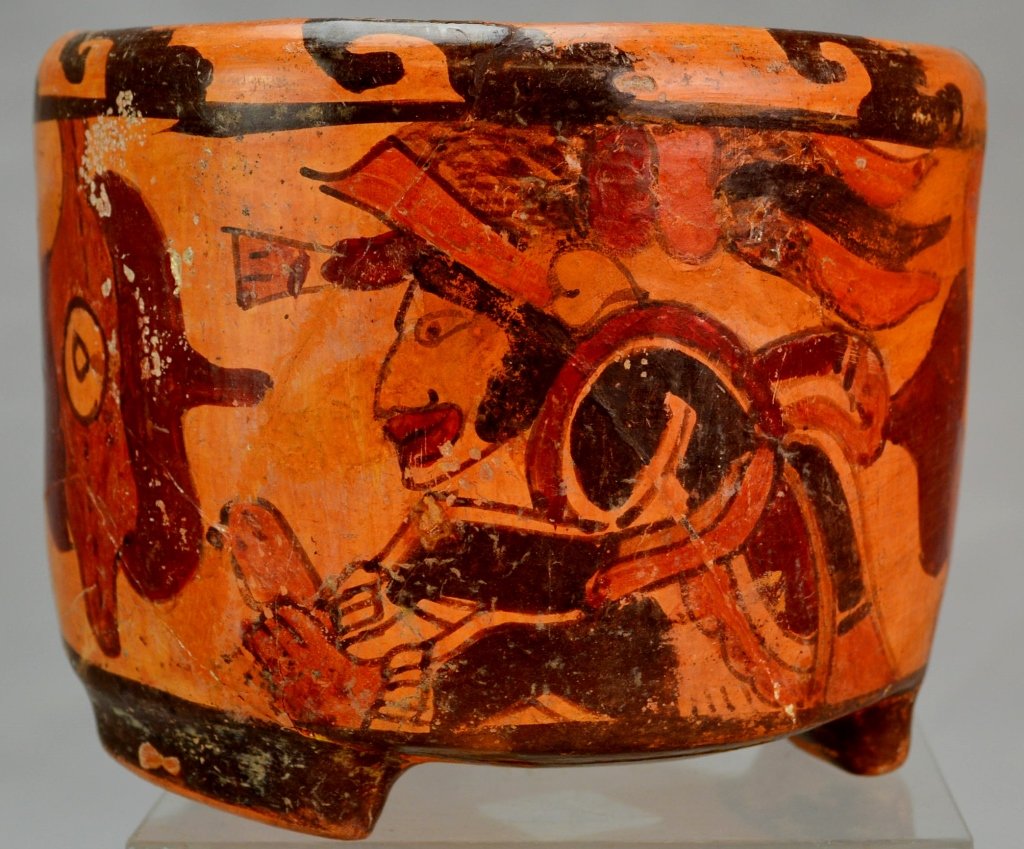 Mayan Polychrome Cylinder Vase: Mayan, 800-1000 A.D. Polychrome decoration of three separate figures, multi-band decoration to interior, sits upon (3) slab feet. Extensive restoration. 6" x 5" From the living estate of Professor Wil
