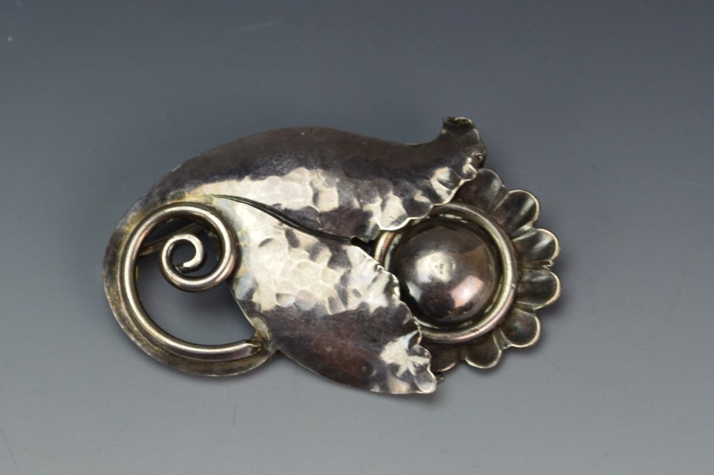 Georg Jensen Sterling Silver Brooch: Georg Jensen sterling silver hand wrought floral brooch. 2"
