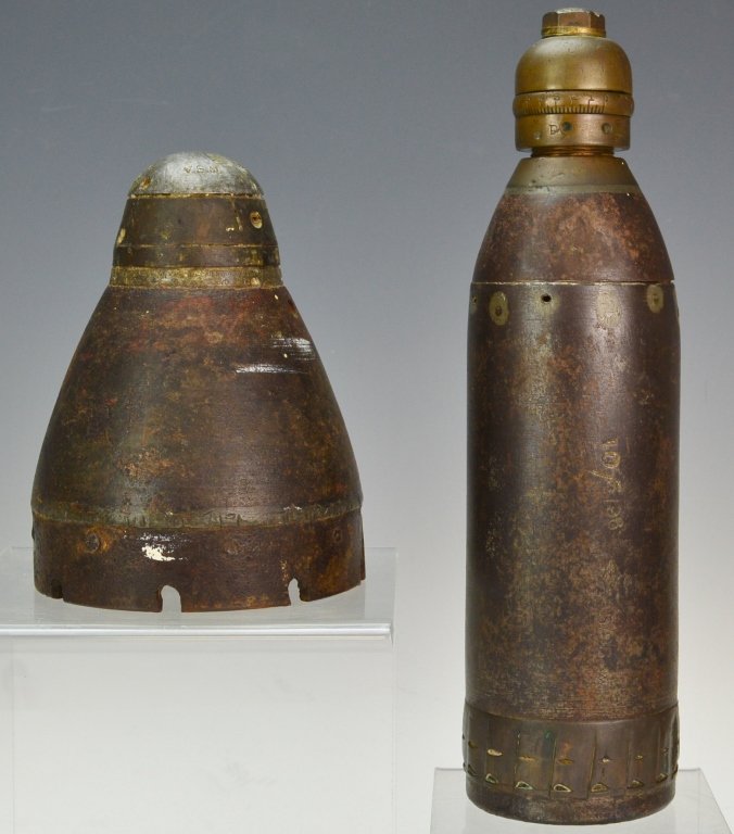Boer War Shell and Fuze Tip: 15 Pounder Artillery Shell, Mark II, Makers mark "FS" and British Artillery mark "RL", includes fuze tip and timer, Marked: 10.3.96, measures: 11" x 3". Also includes large fuze shell tip measuring 4.