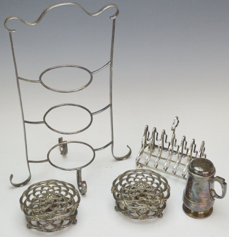 Silverplate Grouping: Includes 5 pieces --3 tiered plate holder measures 16.5 tall, Toast holder holds 6 pieces, 2 flower frogs, 1 muffineer,