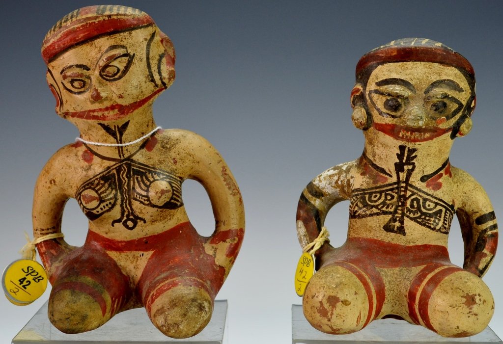 Pair Nicoya Polychrome Figurines : Sotheby's: c. A.D. 750-1000, of seated females holding hands to their hips, and painted in cream with black and red decorations. Heights 6" and 6 3/8", literature: H. von winning, pre-columbian art of mexico and
