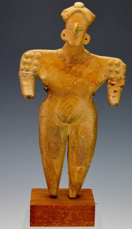 Colima Pottery Figure : Phillips: Mexico, c. 100 B.C. - 500 A.D., the standing female figure, wearing necklace, earplugs, and decorative headdress, and having knops on the shoulders. Height 9.75" Provenance: Phillips 10/30/78 auction,