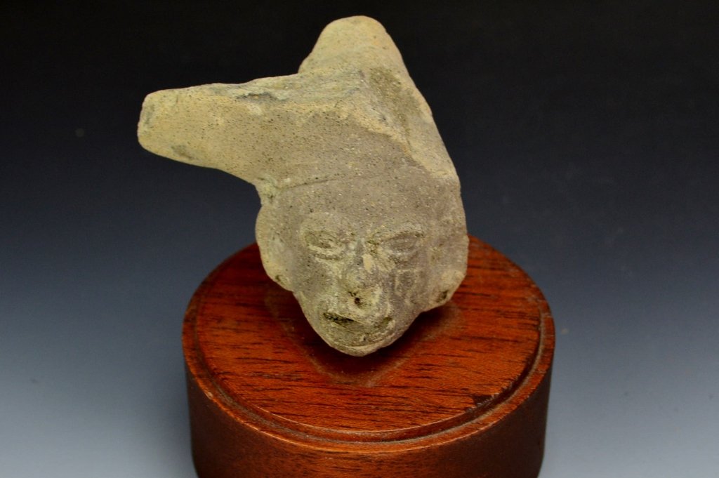 Tumaco Head: Rio Mira, purchased at the Galeria Cano in Bogota Colombia. Includes gallery certificate. 2.25" x 2". From the collection of Professor Robert Williamson, Lehigh University. Being offered again due to 